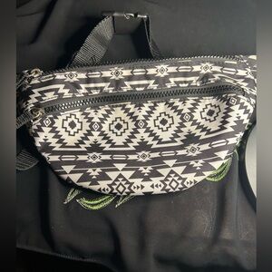 Cute black and white retro fanny pack, unbranded.
